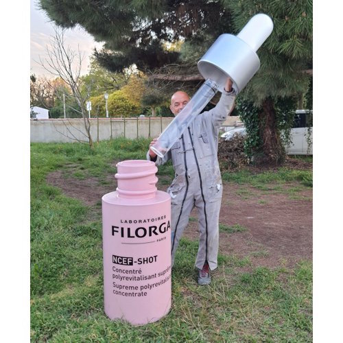 Flacon cosmétique Filorga géant
